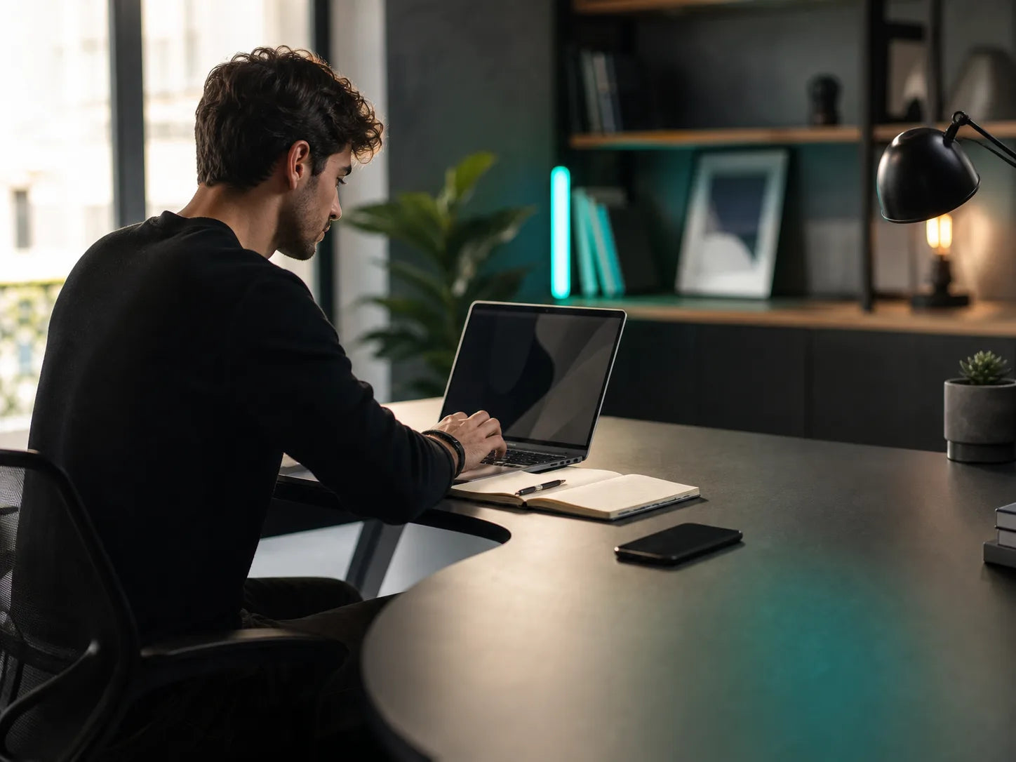 Entrepreneur working at a focused desk setup